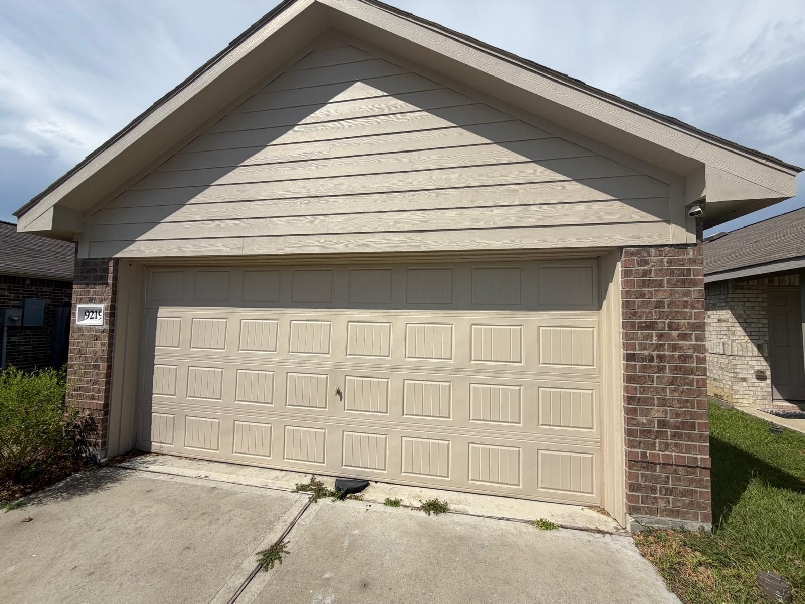 Exterior garage painting — FirstClass Services project